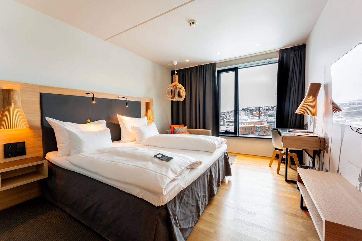 A bright double room overlooking the Tromso cityscape at Clarion Hotel The Edge.