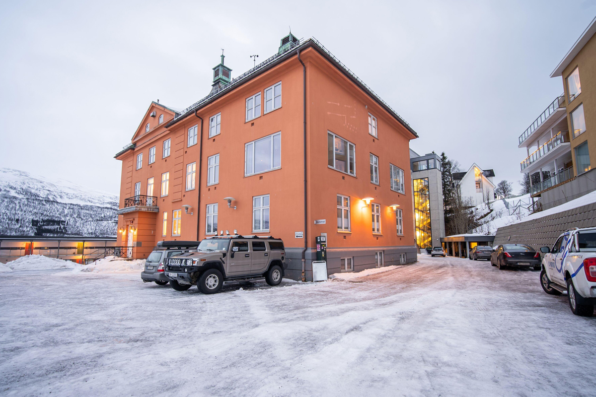 Historic orange main building of St. Elisabeth Hotel & Spa in Tromso, Norway.