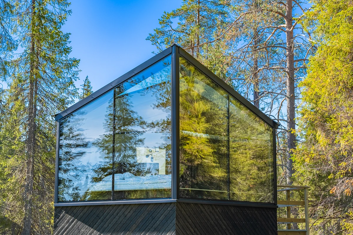 Magical Pond Glass Igloos in Lapland during the colorful autumn season