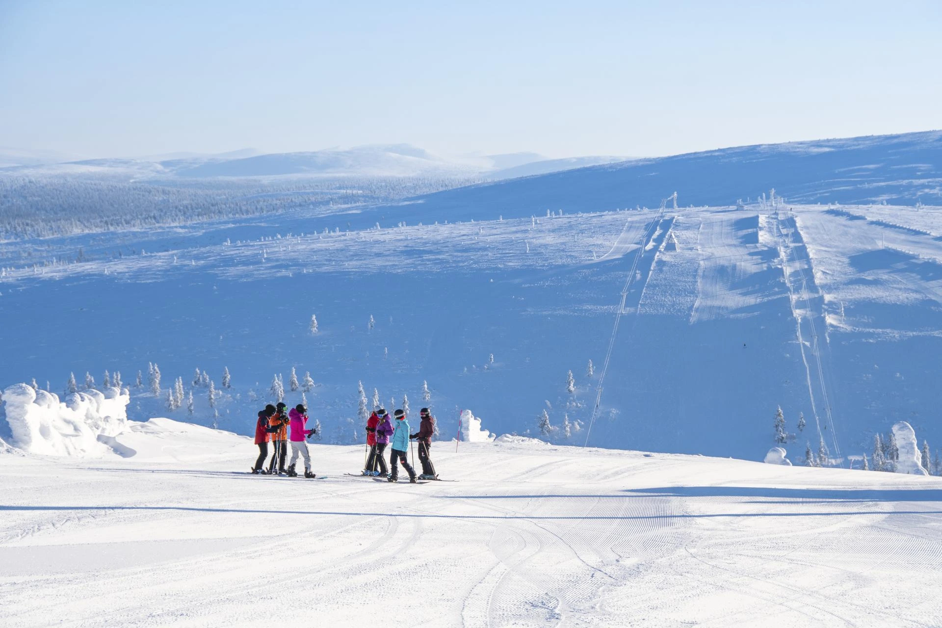 Saariselkä Skiers on top of the Fell in Lapland